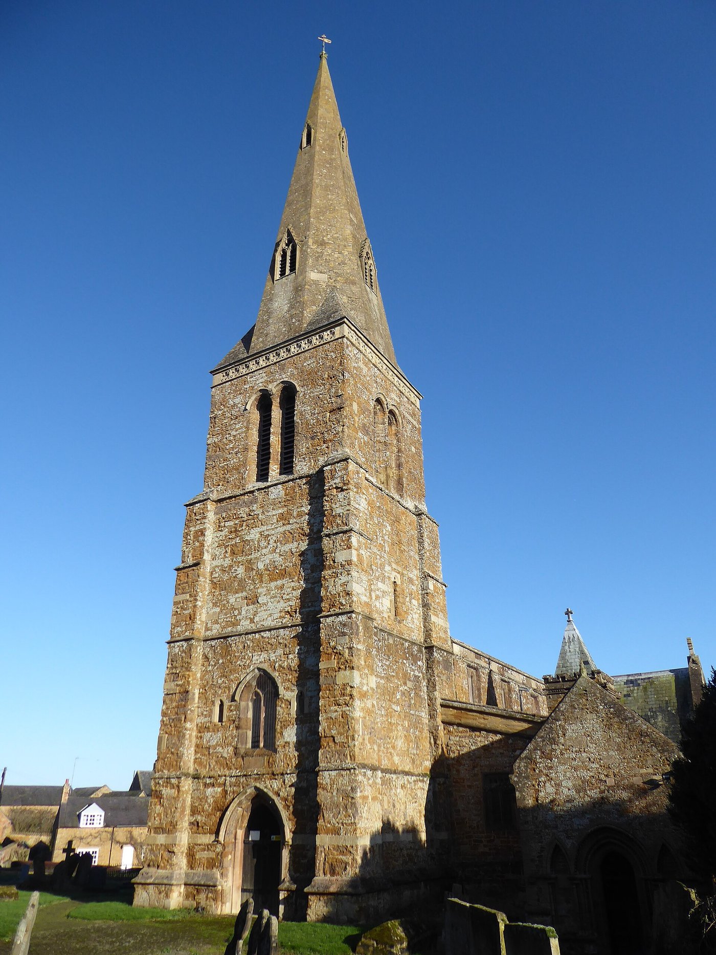 The west tower and octagonal broach spire of All Saints Church